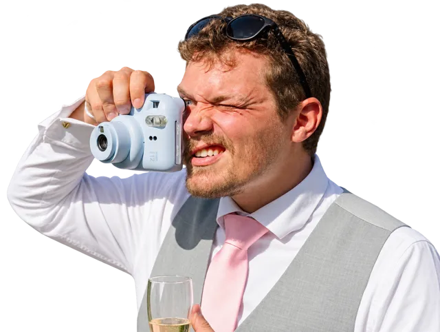 Matthieu holding an instant camera